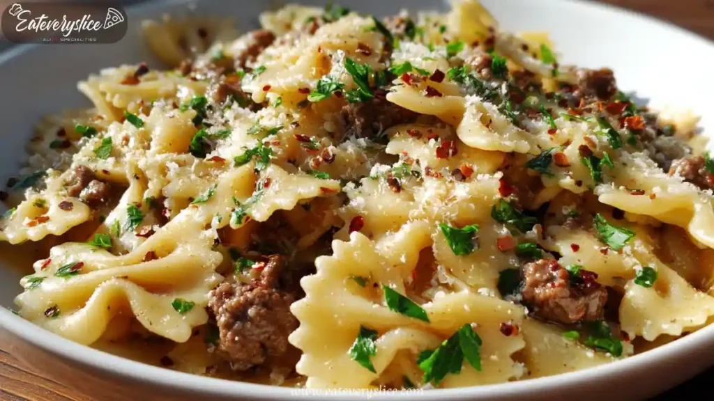 Bowtie pasta with garlic butter, ground beef, parsley, red pepper flakes and parmesan