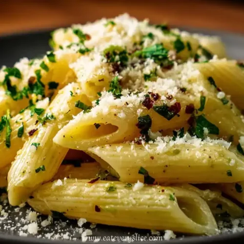 creamy garlic penne pasta with parmesan and herbs