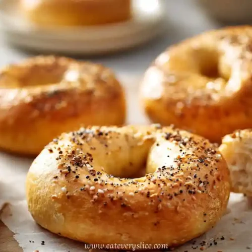 golden Greek yogurt breakfast bagels with cream cheese filling and poppy seed topping